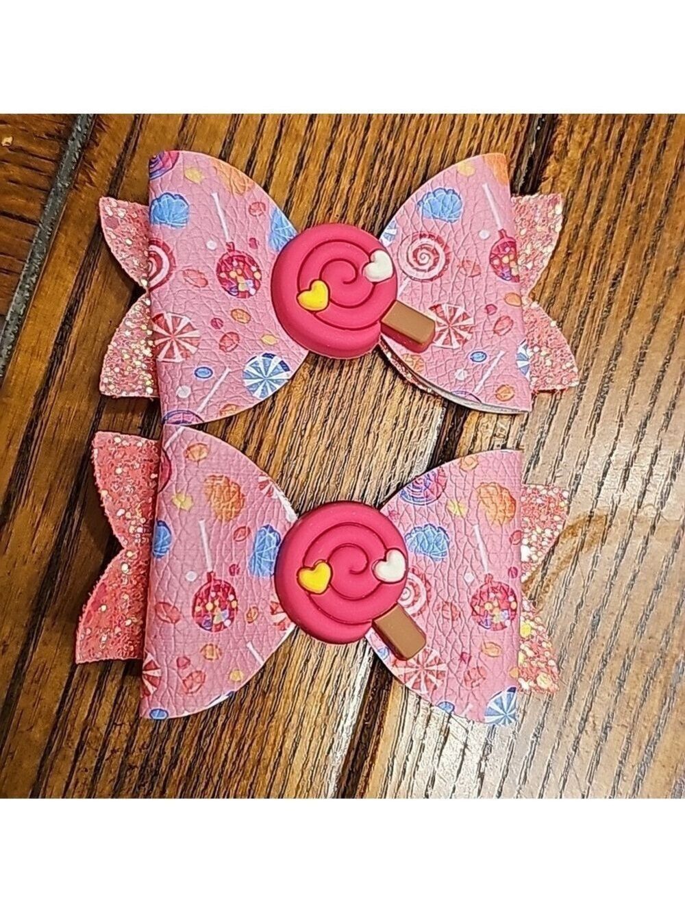 One pair of pink candy land hair bows
